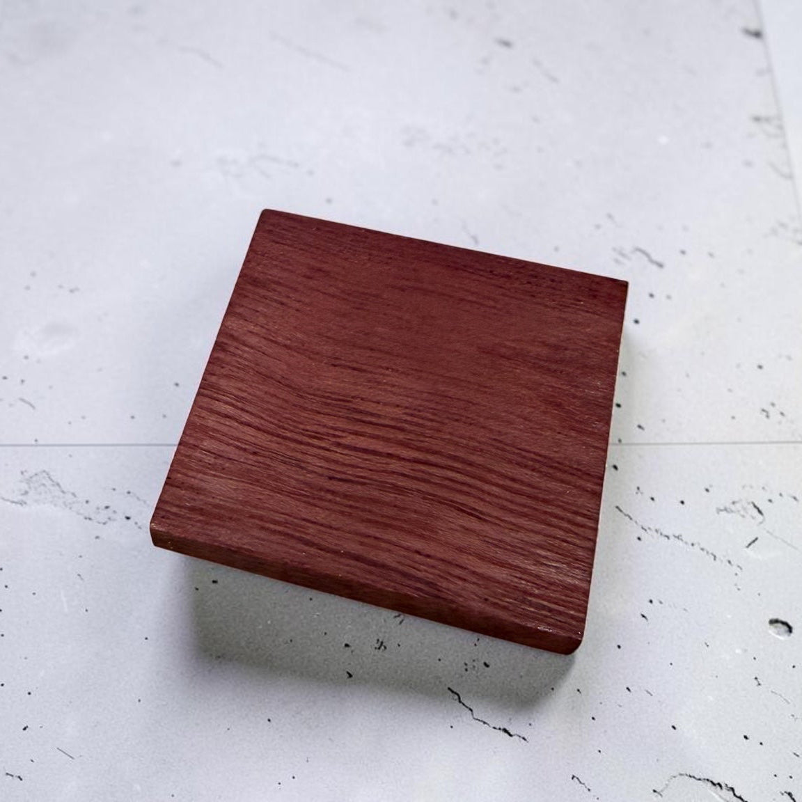 Wooden block on a light gray surface